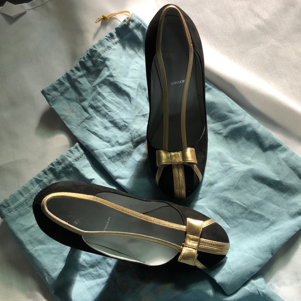 Black suede pump heel with gold bow